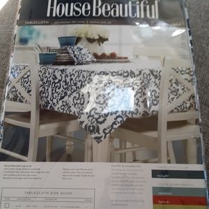 House Beautiful new table cloth. Size 52 x 70.